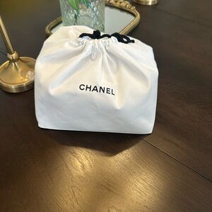 CHANEL Elegant White and Black Pouch